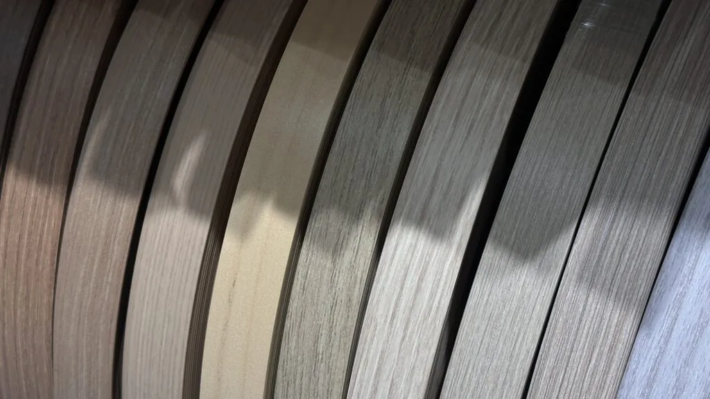 Wood grain edge banding samples in various finishes