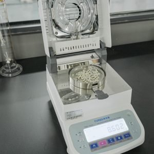 Raw material moisture tester