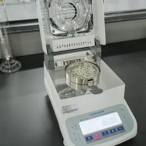Raw material moisture tester